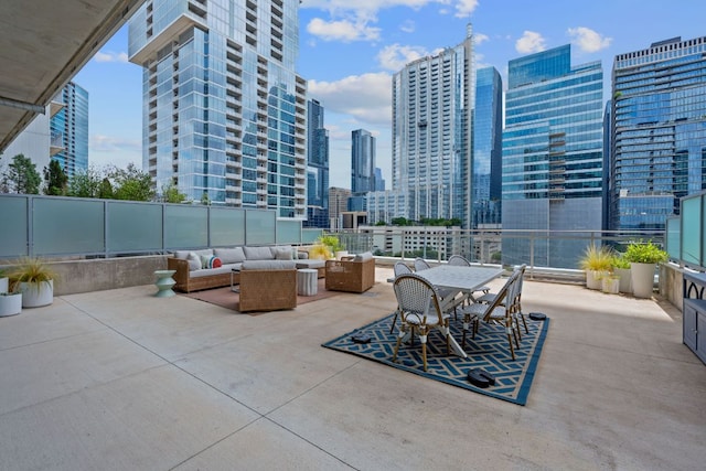 222 W Ave Unit 1001, Austin, TX 78701 - view of patio / terrace with an outdoor living space and a view of skyline