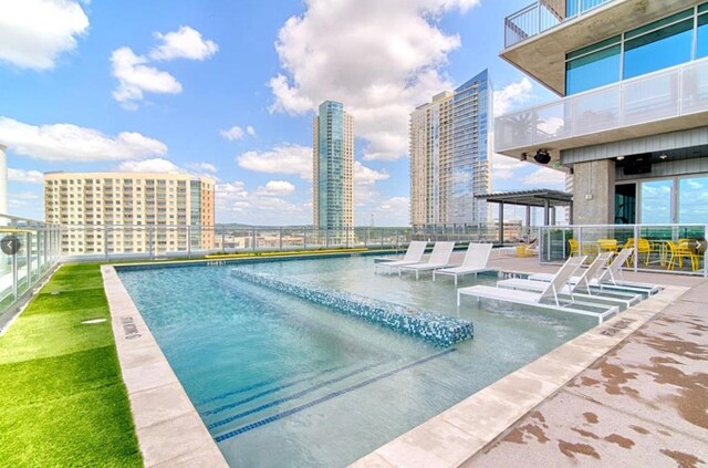 222 W Ave Unit 1001, Austin, TX 78701 - community pool featuring a view of city