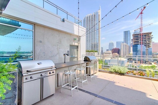 222 W Ave Unit 1001, Austin, TX 78701 - view of patio / terrace with a view of skyline