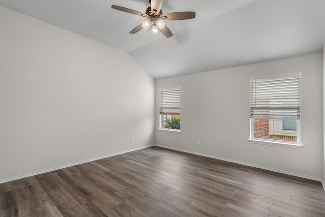 2141 Rachel Ln, Round Rock, TX 78664 - empty room featuring dark wood-style floors, ceiling fan, baseboards, and vaulted ceiling