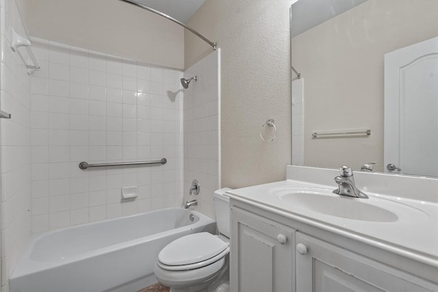 2141 Rachel Ln, Round Rock, TX 78664 - full bath featuring toilet, a textured wall, vanity, and bathtub / shower combination