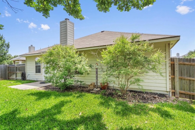2141 Rachel Ln, Round Rock, TX 78664 - back of property featuring a chimney