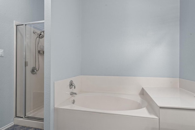 2141 Rachel Ln, Round Rock, TX 78664 - bathroom featuring a garden tub and a shower stall