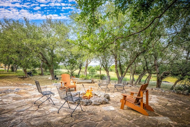 1606 Bordeaux Blanc, New Braunfels, TX 78132 - view of patio with an outdoor fire pit