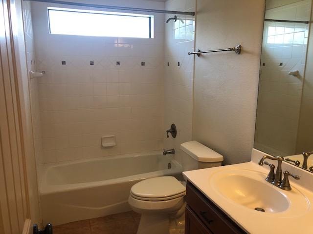 22340 Briarcliff Dr, Spicewood, TX 78669 - full bathroom featuring vanity, toilet, tile patterned floors, and shower / bathtub combination