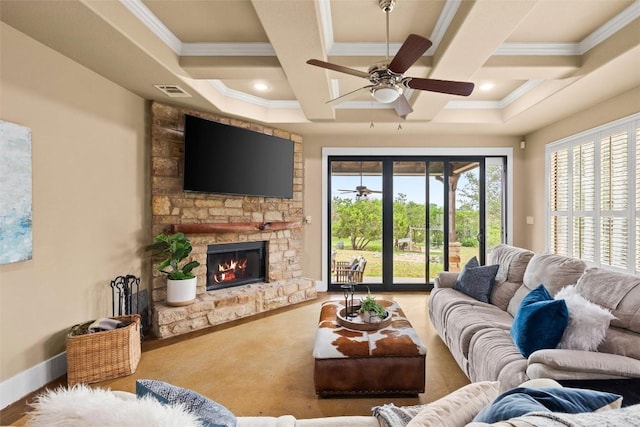 121 White Wash, Dripping Springs, TX 78620 - carpeted living room featuring coffered ceiling, a ceiling fan, ornamental molding, beam ceiling, and a stone fireplace