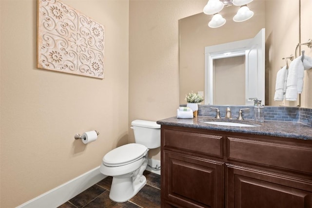121 White Wash, Dripping Springs, TX 78620 - half bath featuring toilet, vanity, baseboards, tile patterned floors, and a chandelier