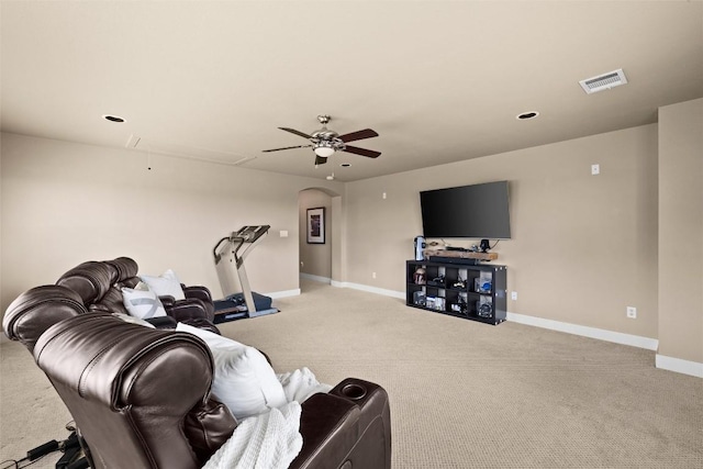121 White Wash, Dripping Springs, TX 78620 - living room with attic access, light carpet, baseboards, a ceiling fan, and arched walkways