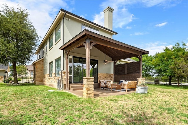 121 White Wash, Dripping Springs, TX 78620 - back of house with an outdoor hangout area, ceiling fan, stucco siding, a chimney, and a patio area