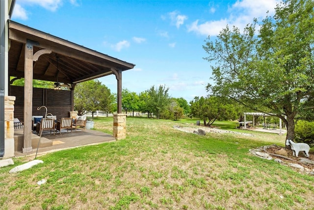 121 White Wash, Dripping Springs, TX 78620 - view of grassy yard with a patio and a ceiling fan