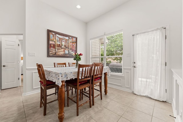 2600 Lost Mine Trl, Leander, TX 78641 - dining area with light tile patterned flooring, a decorative wall, a wainscoted wall, and recessed lighting