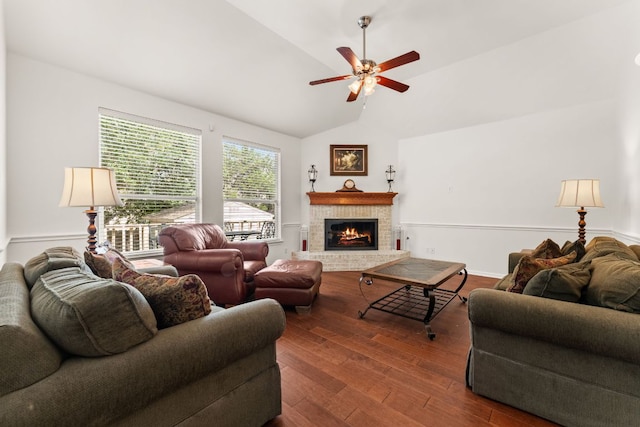 2600 Lost Mine Trl, Leander, TX 78641 - living area with lofted ceiling, ceiling fan, dark wood-style floors, and a fireplace
