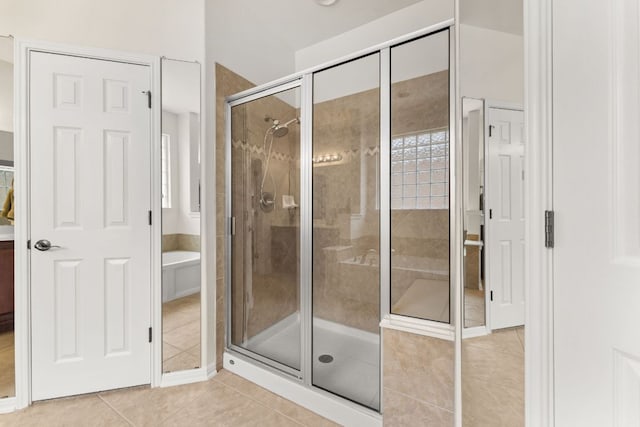 2600 Lost Mine Trl, Leander, TX 78641 - full bathroom with tile patterned flooring and a stall shower