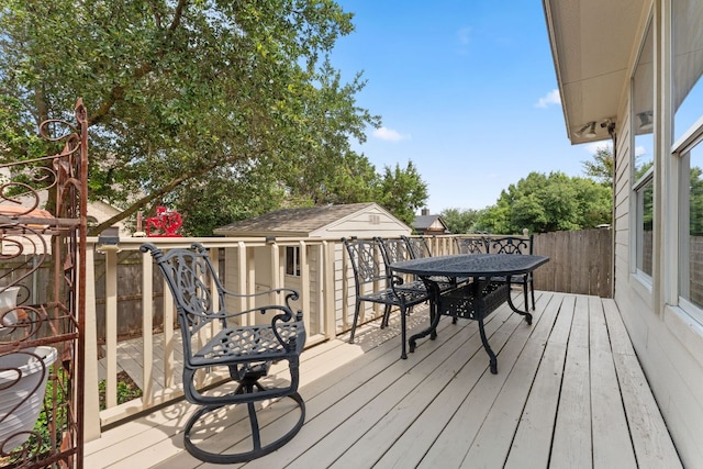 2600 Lost Mine Trl, Leander, TX 78641 - wooden deck with outdoor dining area and an outdoor structure