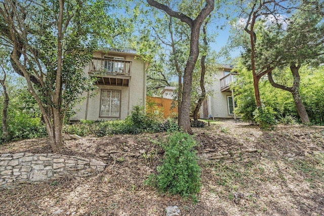 3304 Clawson Rd, Austin, TX 78704 - back of house featuring a balcony and stucco siding