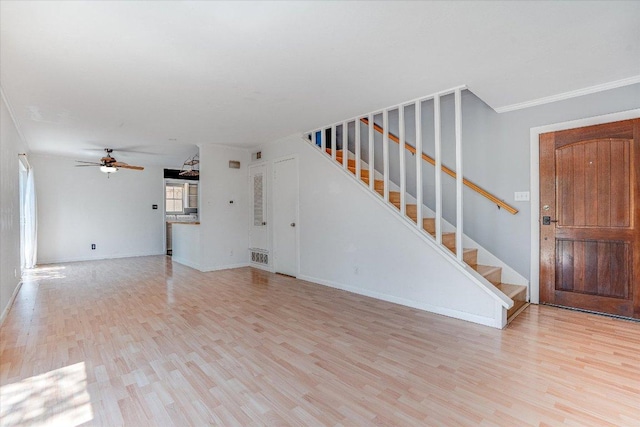 3304 Clawson Rd, Austin, TX 78704 - unfurnished living room with wood finished floors, stairs, and a ceiling fan