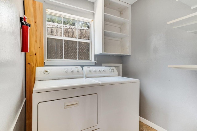 3304 Clawson Rd, Austin, TX 78704 - laundry area with washing machine and dryer and baseboards