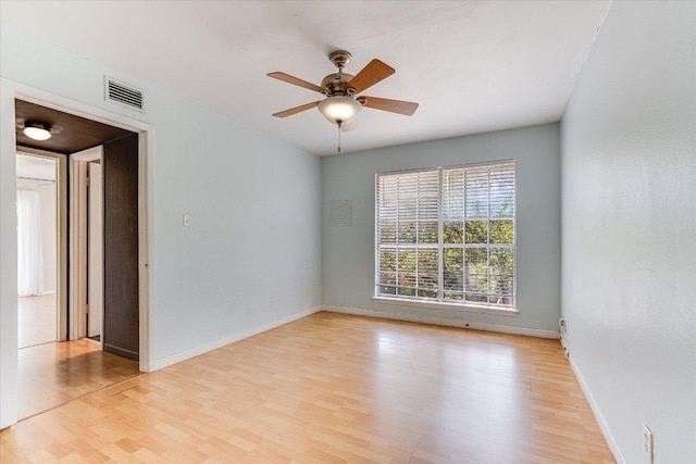 3304 Clawson Rd, Austin, TX 78704 - empty room with light wood finished floors, a ceiling fan, and baseboards