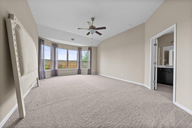 202 Westfield St, Hutto, TX 78634 - carpeted spare room featuring ceiling fan, lofted ceiling, and baseboards