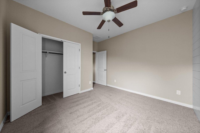 202 Westfield St, Hutto, TX 78634 - unfurnished bedroom featuring carpet flooring, a closet, baseboards, and ceiling fan