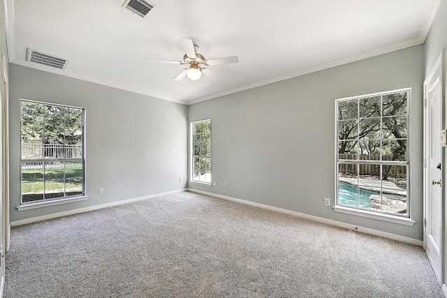 106 Los Altos Dr, Lakeway, TX 78734 - unfurnished room with ceiling fan, carpet flooring, baseboards, and crown molding