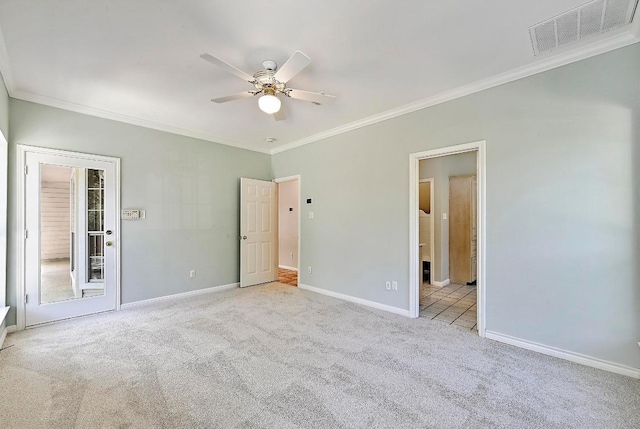 106 Los Altos Dr, Lakeway, TX 78734 - unfurnished bedroom with ornamental molding, carpet flooring, baseboards, connected bathroom, and a ceiling fan