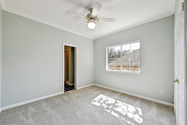 106 Los Altos Dr, Lakeway, TX 78734 - unfurnished bedroom featuring carpet floors, crown molding, baseboards, and ceiling fan