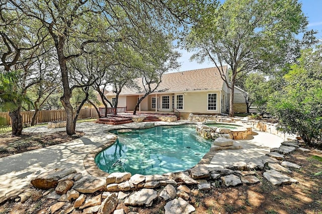 106 Los Altos Dr, Lakeway, TX 78734 - view of pool featuring a fenced backyard, a patio area, and a pool with connected hot tub