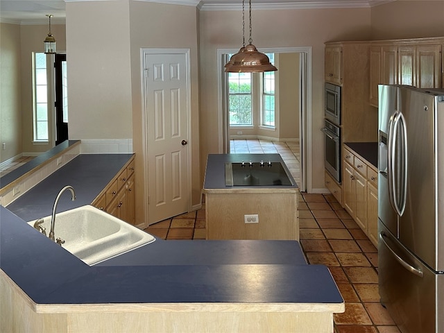 106 Los Altos Dr, Lakeway, TX 78734 - kitchen with stainless steel appliances, crown molding, a sink, a center island, and light brown cabinetry