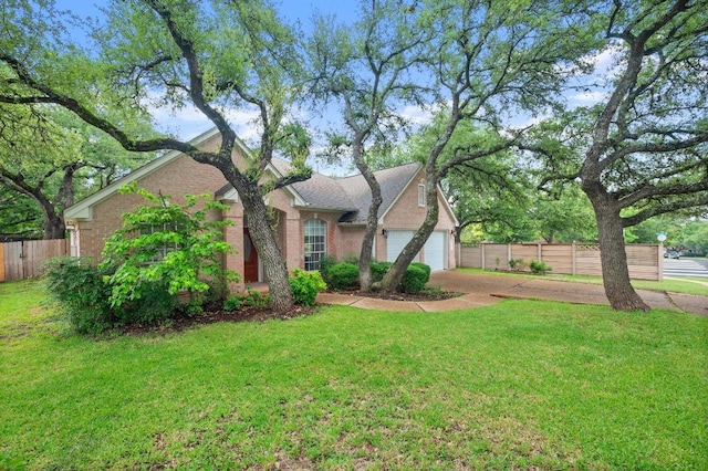 10601 Beckwood Dr, Austin, TX 78726 - view of front of home featuring a garage and brick siding