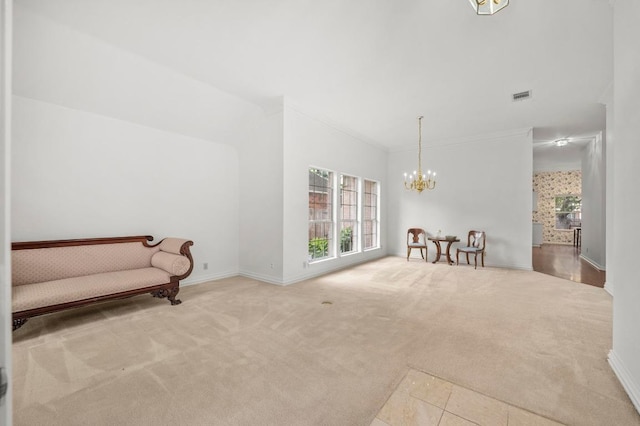 10601 Beckwood Dr, Austin, TX 78726 - living area with carpet, a chandelier, baseboards, and ornamental molding