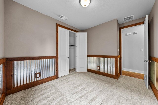 20525 Martin Ln, Pflugerville, TX 78660 - unfurnished bedroom with carpet, baseboards, and a closet