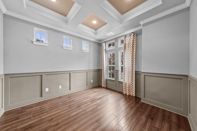 20525 Martin Ln, Pflugerville, TX 78660 - empty room with wood finished floors, beamed ceiling, crown molding, coffered ceiling, and a decorative wall