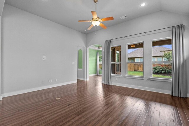 20525 Martin Ln, Pflugerville, TX 78660 - spare room featuring arched walkways, baseboards, wood finished floors, ceiling fan, and recessed lighting