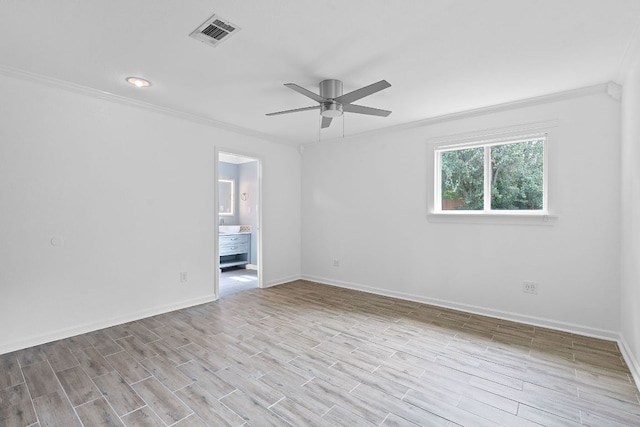 1515 Mearns Meadow Blvd, Austin, TX 78758 - spare room featuring crown molding, ceiling fan, baseboards, and light wood-type flooring