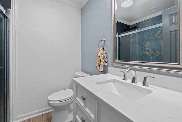 1515 Mearns Meadow Blvd, Austin, TX 78758 - bathroom with ornamental molding, toilet, vanity, a textured wall, and wood finished floors