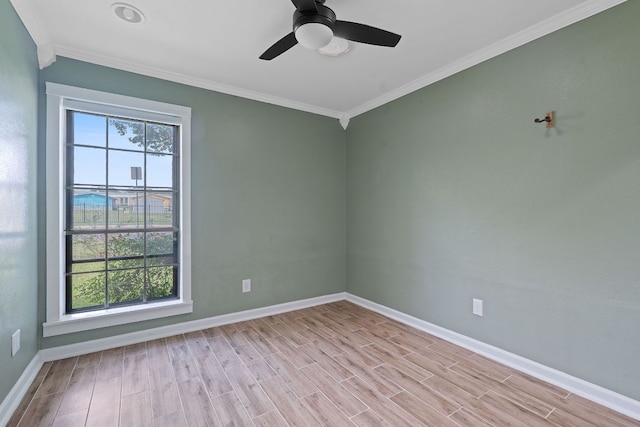 1515 Mearns Meadow Blvd, Austin, TX 78758 - unfurnished room with baseboards, light wood finished floors, crown molding, and ceiling fan