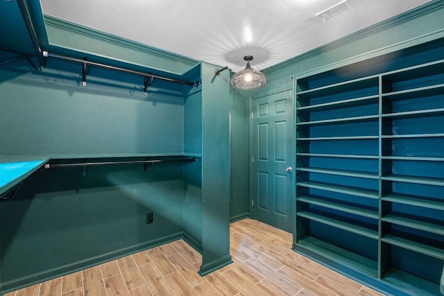 1515 Mearns Meadow Blvd, Austin, TX 78758 - spacious closet featuring light wood-type flooring