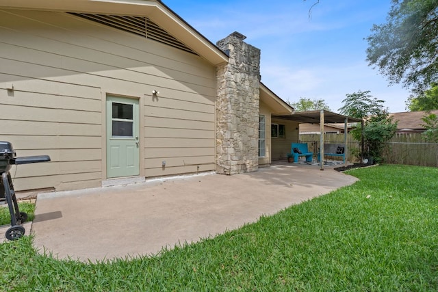 1515 Mearns Meadow Blvd, Austin, TX 78758 - rear view of house featuring a patio and a chimney
