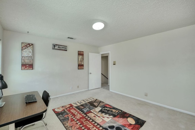 1604 W Creek Loop, Round Rock, TX 78681 - carpeted office space featuring a textured ceiling and baseboards
