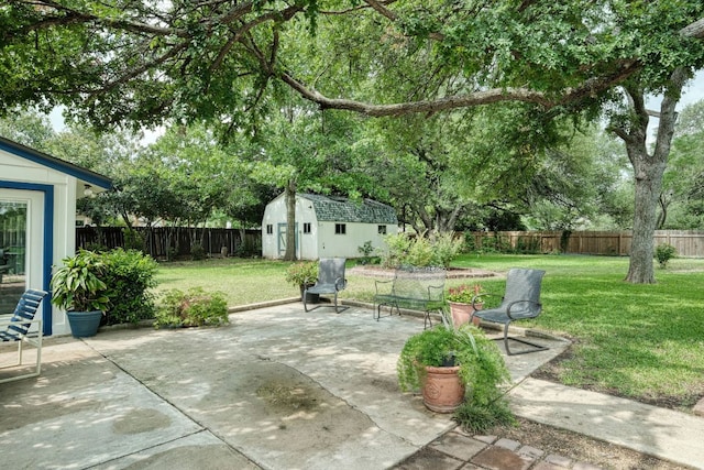 1604 W Creek Loop, Round Rock, TX 78681 - fenced backyard with a storage unit and a patio area