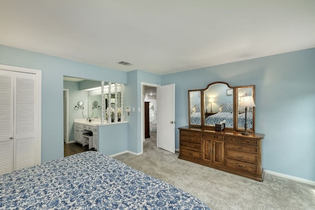 1604 W Creek Loop, Round Rock, TX 78681 - bedroom with carpet and ensuite bath