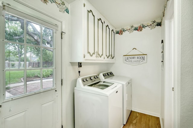1604 W Creek Loop, Round Rock, TX 78681 - laundry area with cabinet space, washer and dryer, and light wood finished floors