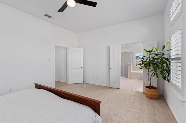 200 Ottaviano Way, Hutto, TX 78634 - bedroom featuring light colored carpet, multiple windows, a ceiling fan, and baseboards