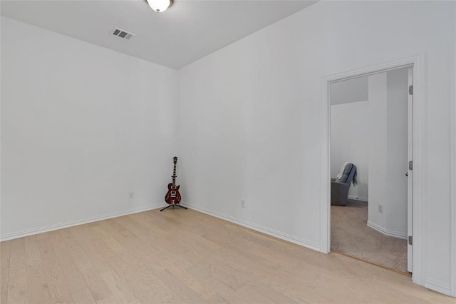 200 Ottaviano Way, Hutto, TX 78634 - empty room with light wood-style flooring and baseboards
