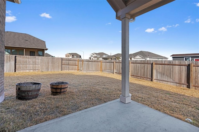200 Ottaviano Way, Hutto, TX 78634 - fenced backyard featuring a patio and a residential view