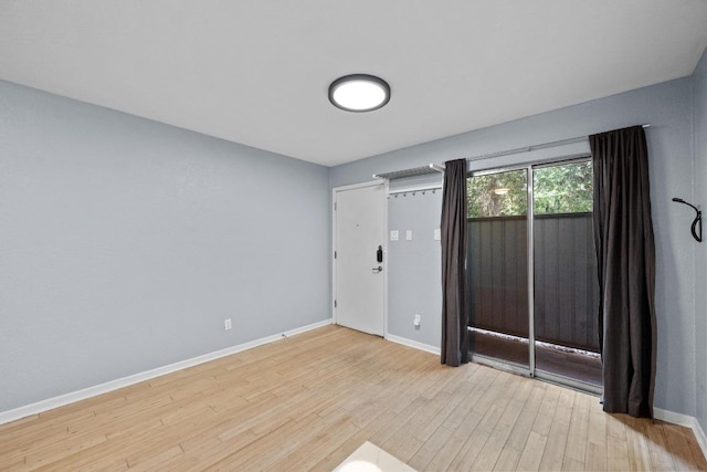 3204 Menchaca Rd Unit 405, Austin, TX 78704 - spare room with wood finished floors and baseboards