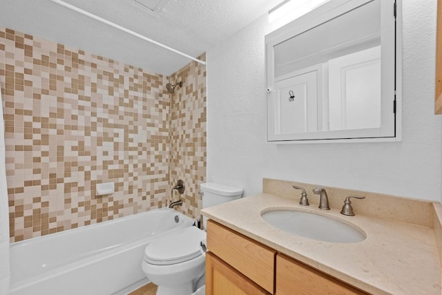 3204 Menchaca Rd Unit 405, Austin, TX 78704 - full bathroom featuring vanity,  shower combination, a textured wall, and a textured ceiling