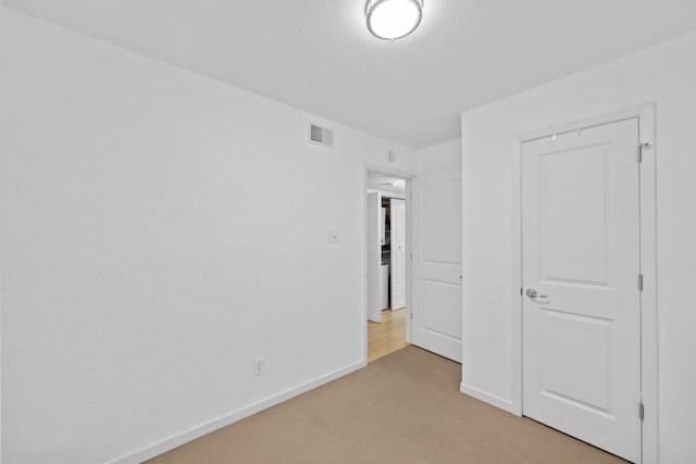 3204 Menchaca Rd Unit 405, Austin, TX 78704 - unfurnished bedroom with light carpet and baseboards