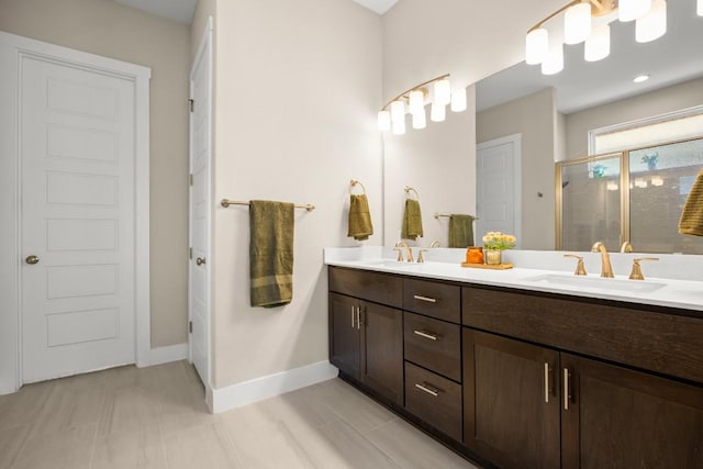 1609 Indian Apple Way, Leander, TX 78641 - full bath featuring double vanity, a stall shower, and baseboards